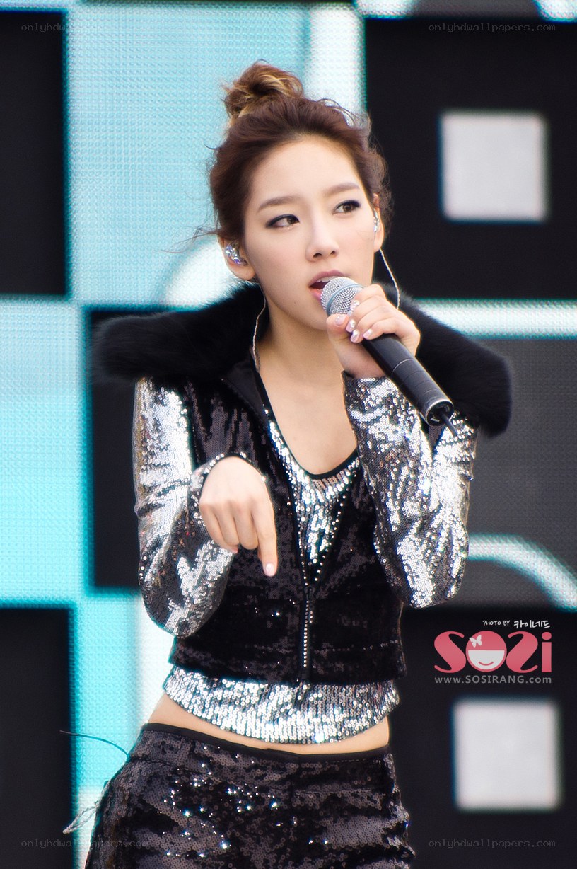 singer performing on stage