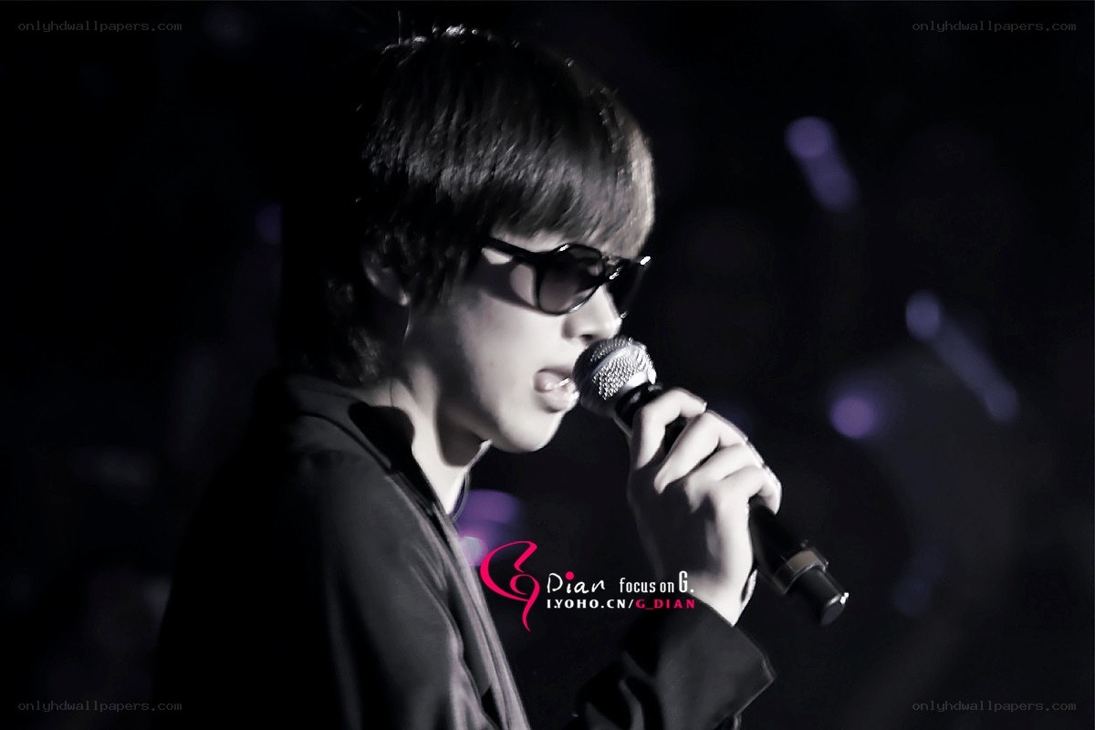 singer performing on stage