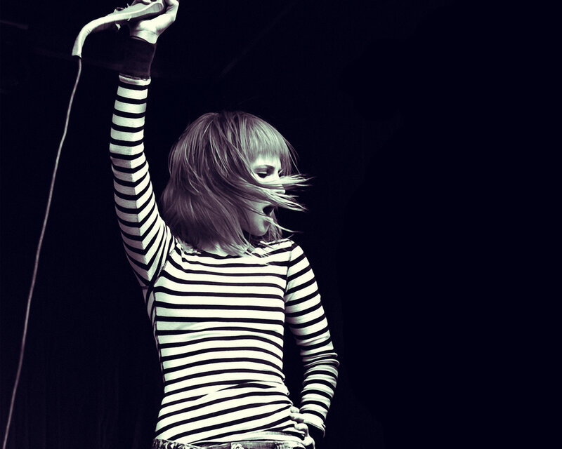singer performing on stage