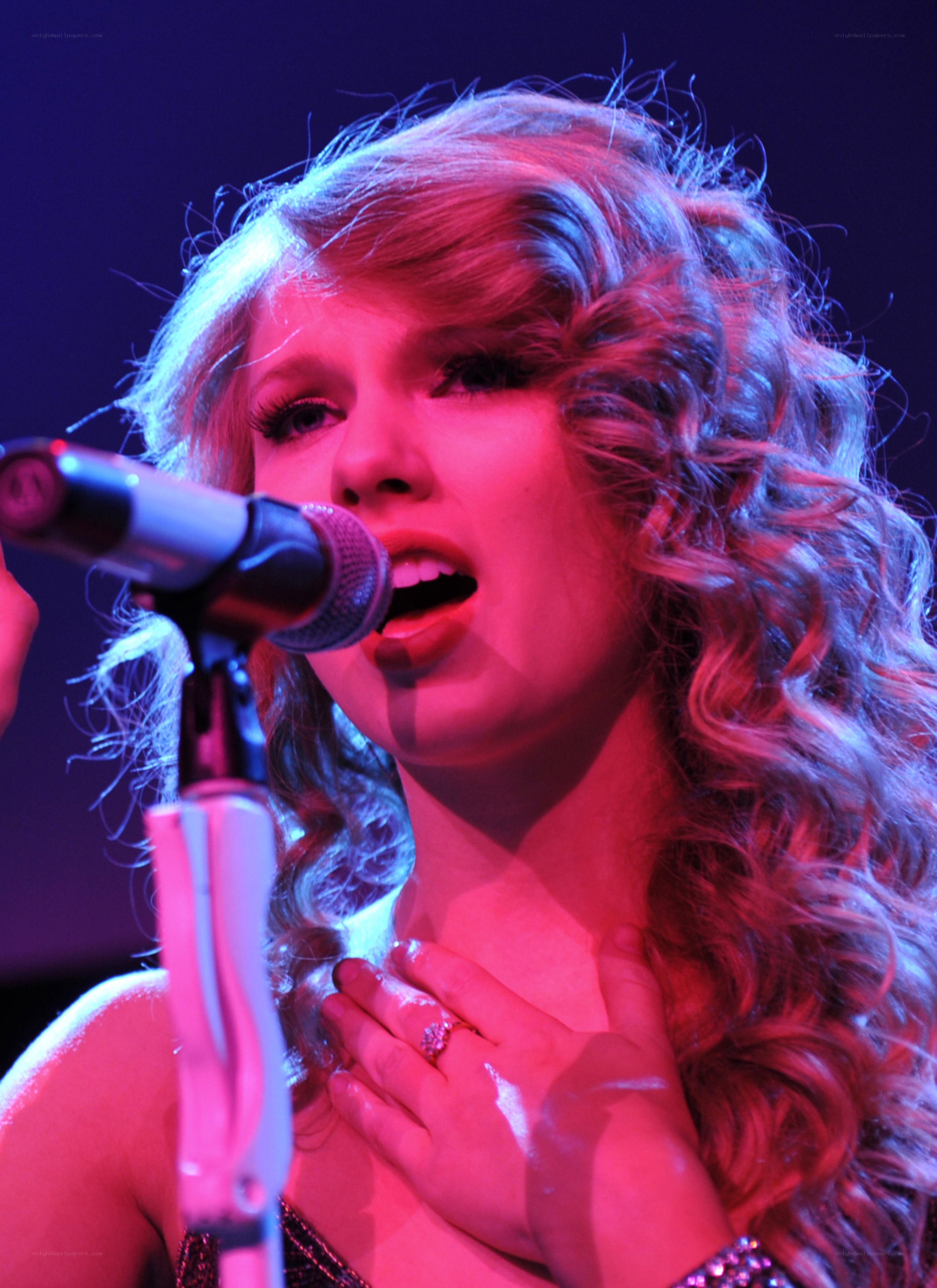 singer performing on stage