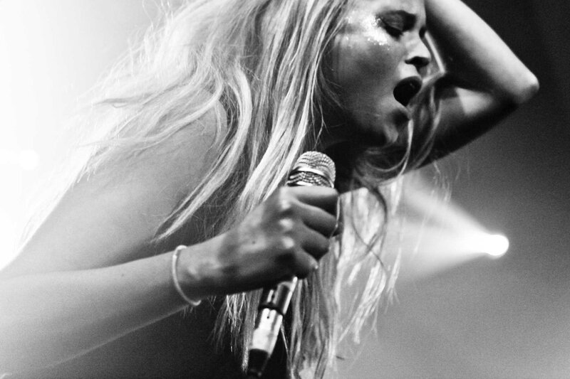 singer performing on stage