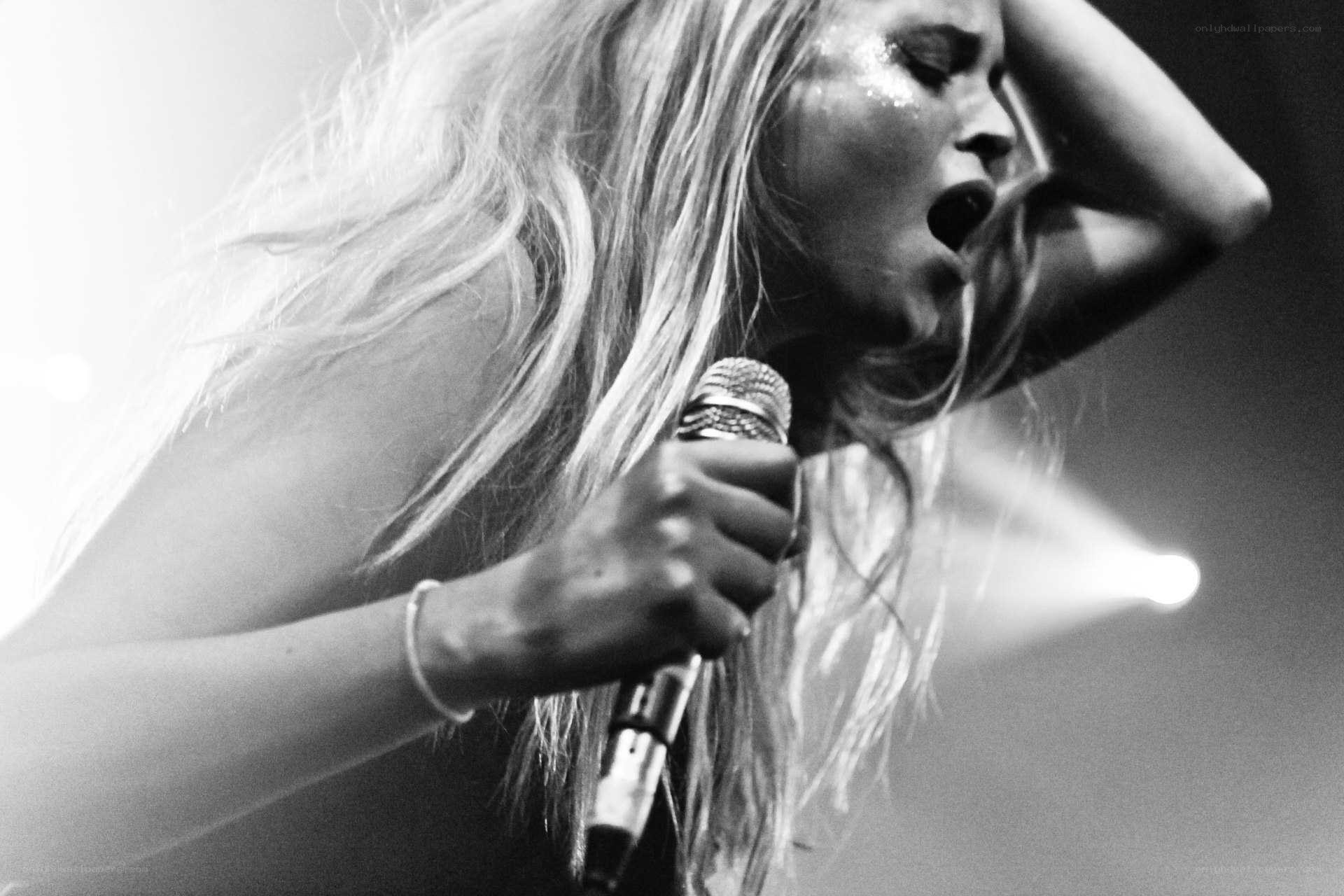 singer performing on stage