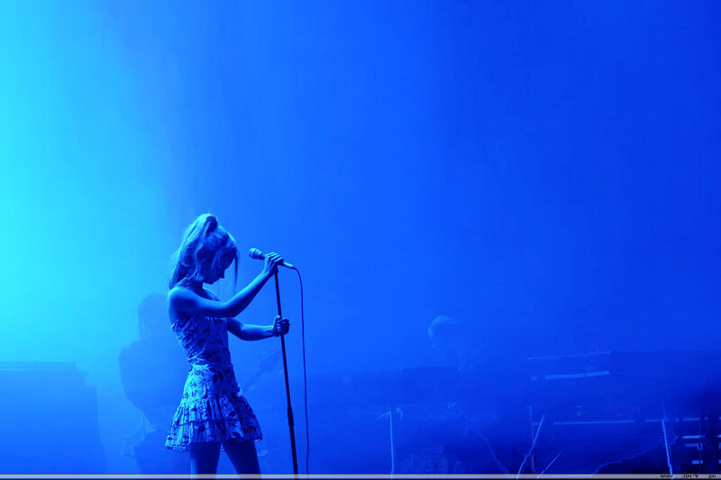 singer performing on stage