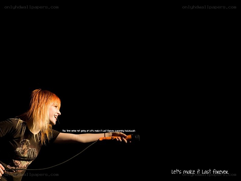 singer performing on stage