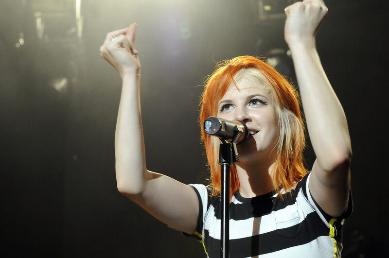 singer performing on stage