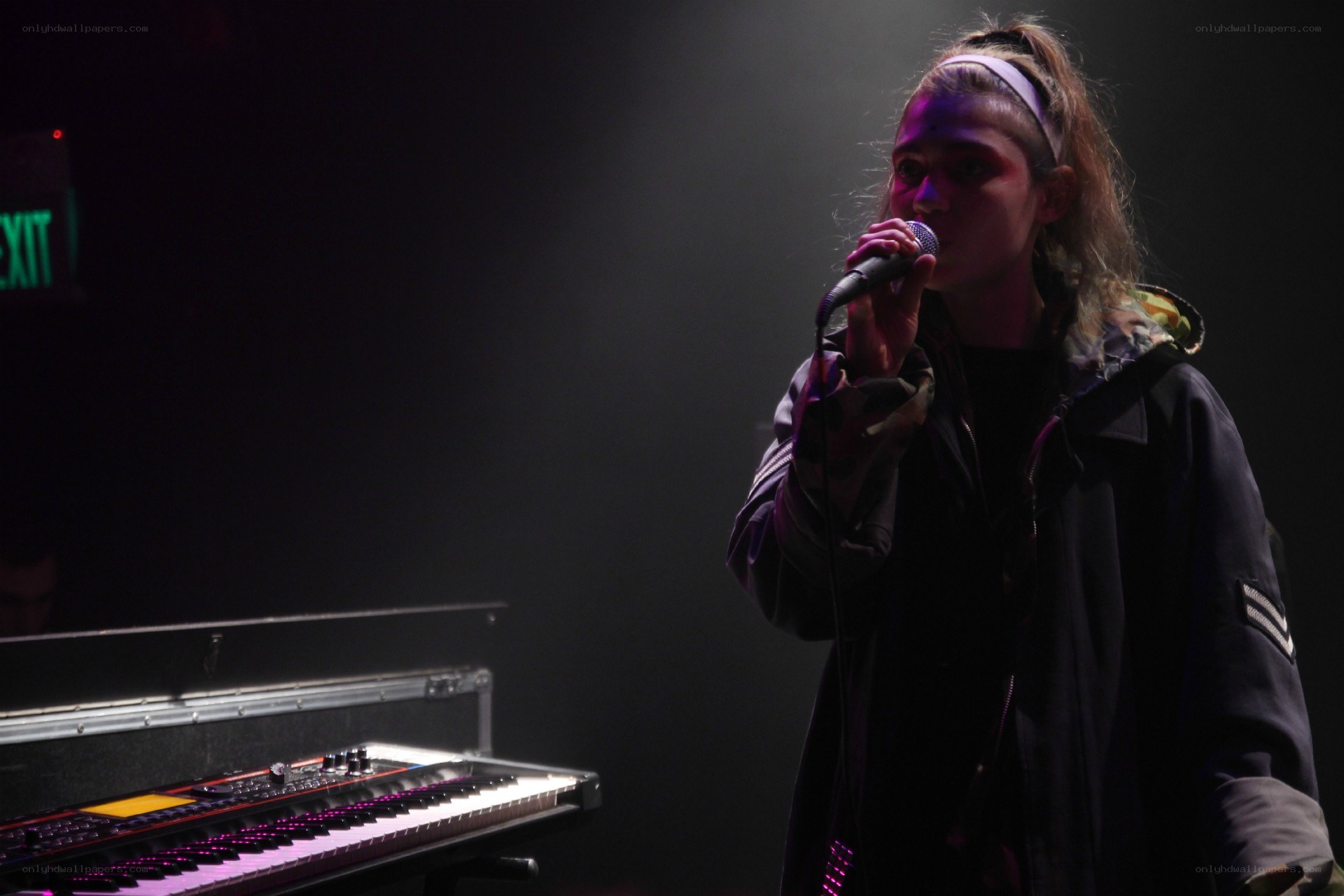 singer performing on stage