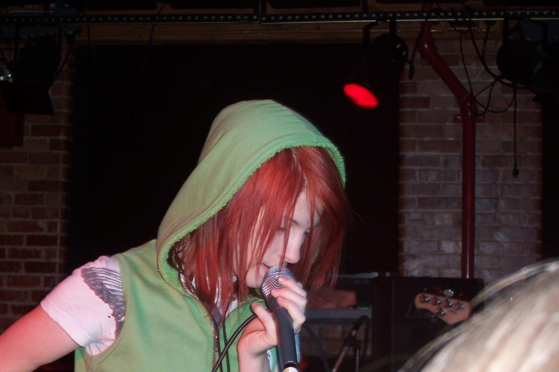 singer performing on stage