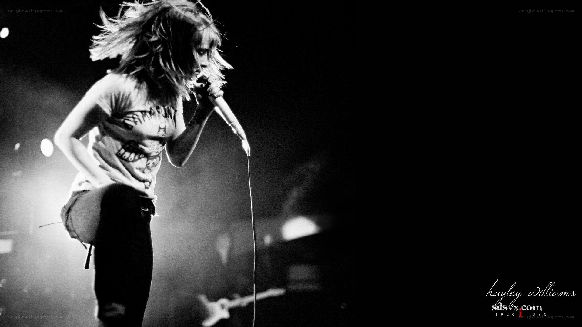 singer performing on stage
