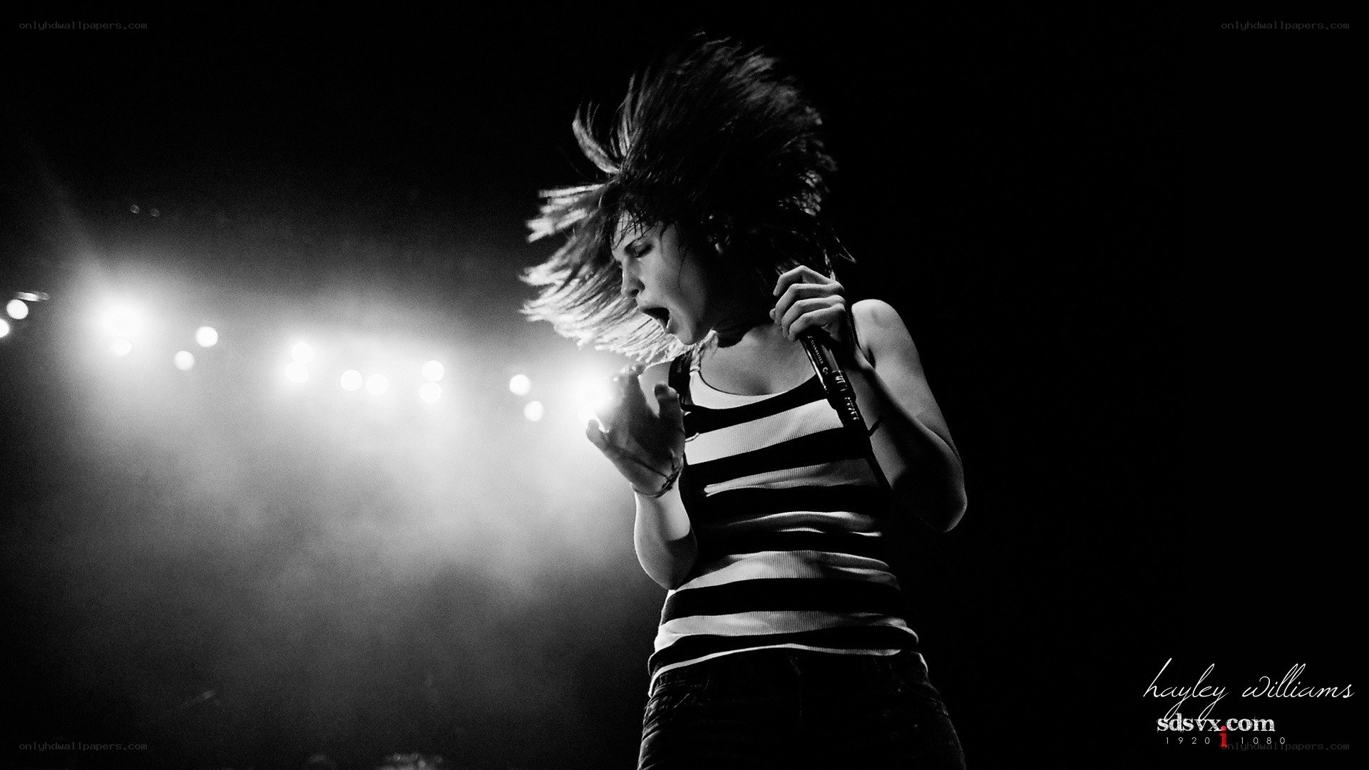 singer performing on stage