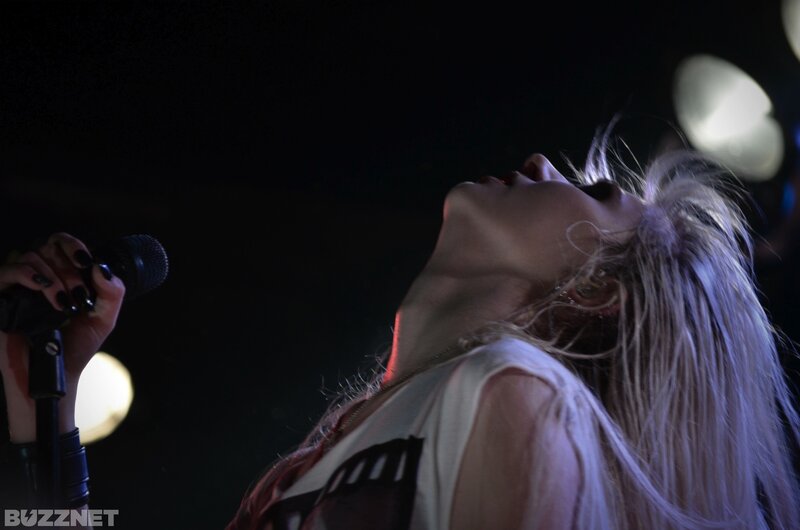 singer performing on stage