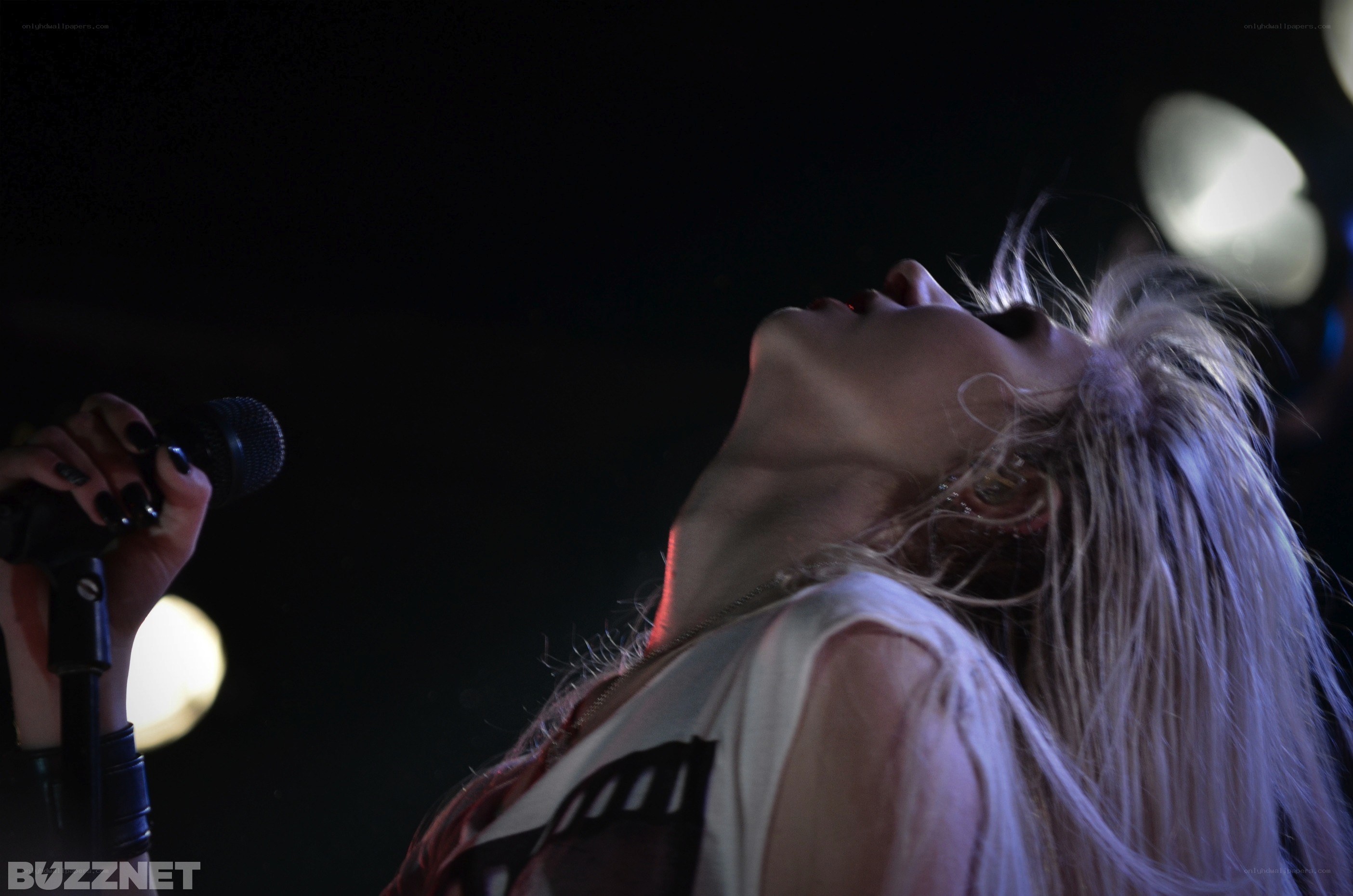 singer performing on stage