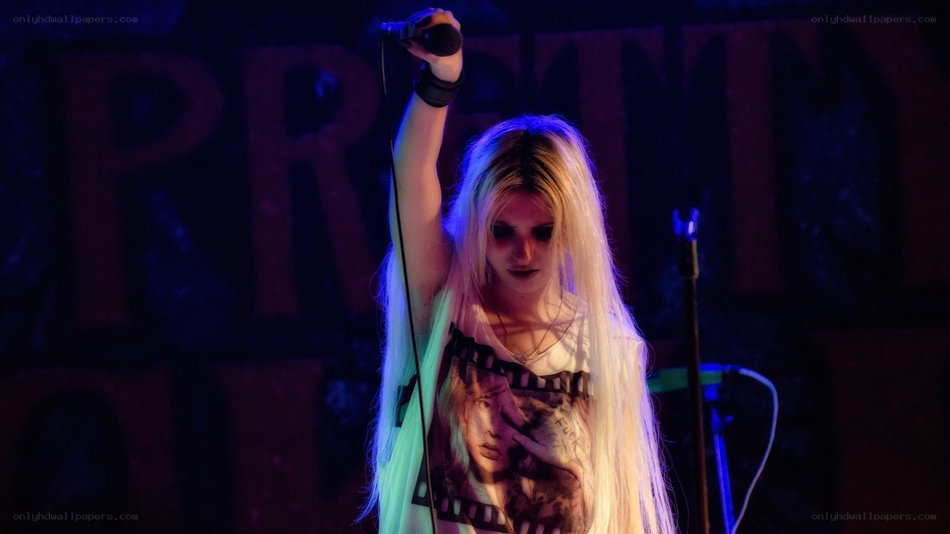singer performing on stage