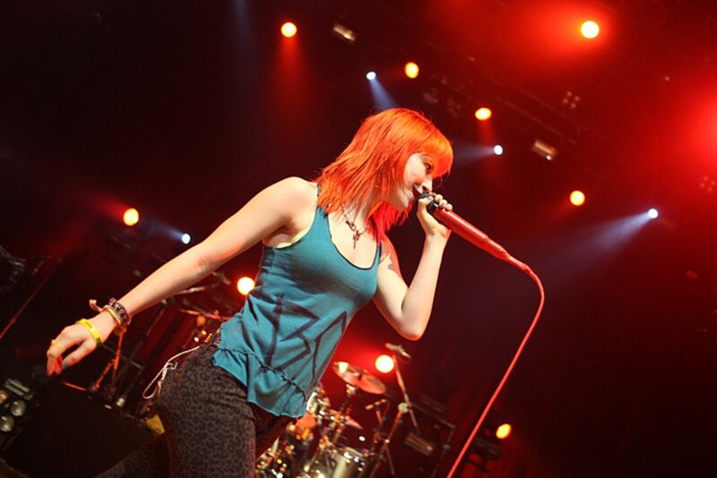 singer performing on stage