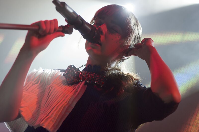 singer performing on stage