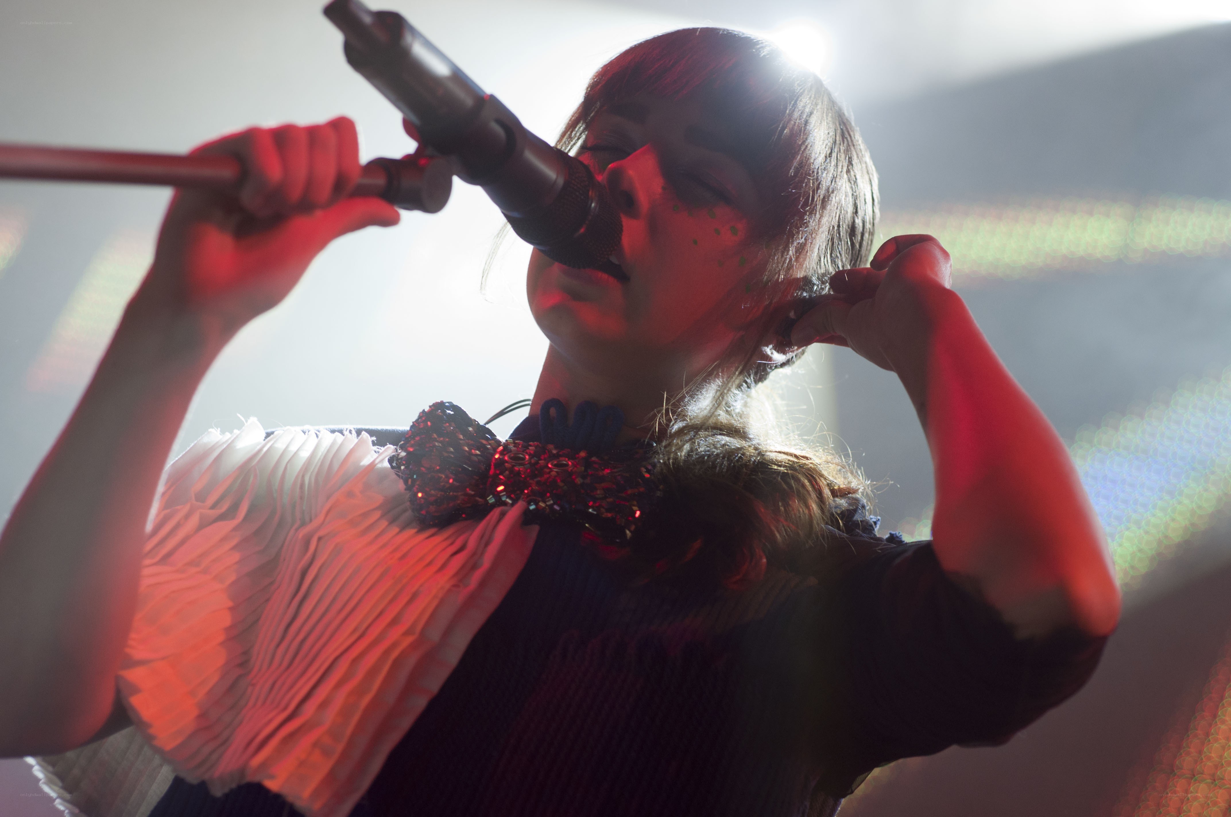singer performing on stage