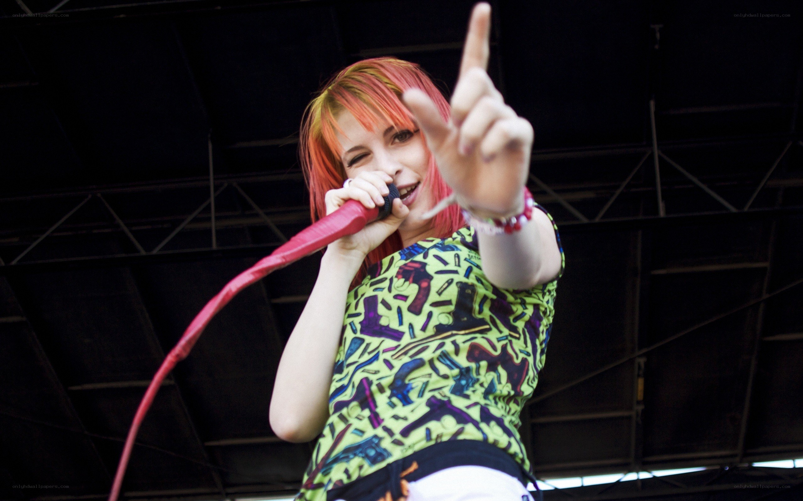 singer performing on stage