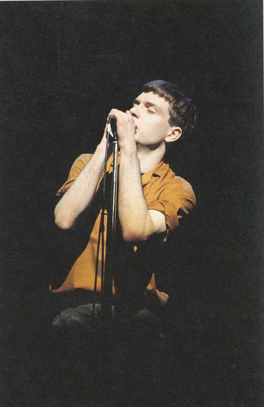 singer performing on stage
