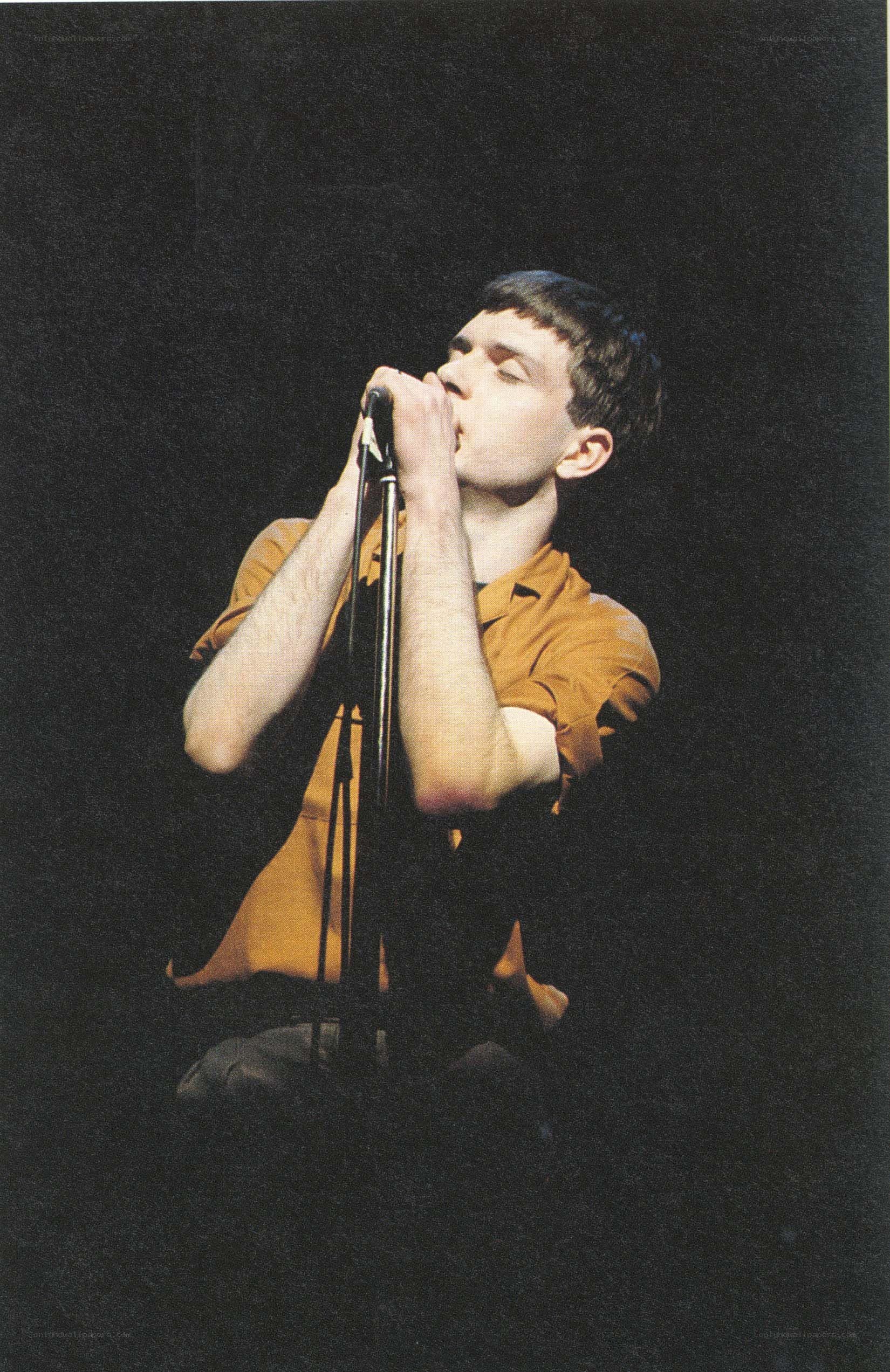 singer performing on stage