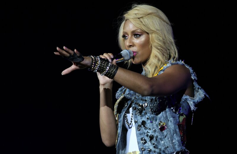 singer performing on stage