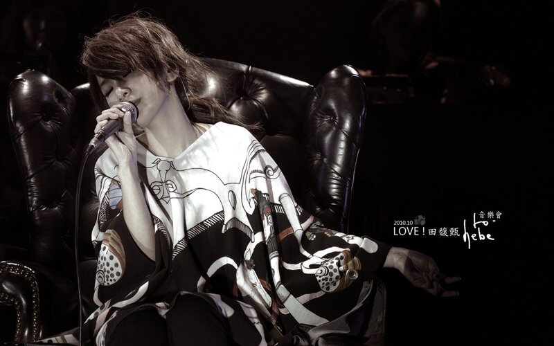 singer performing on stage