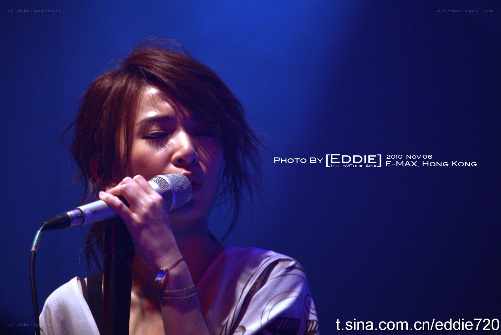 singer performing on stage