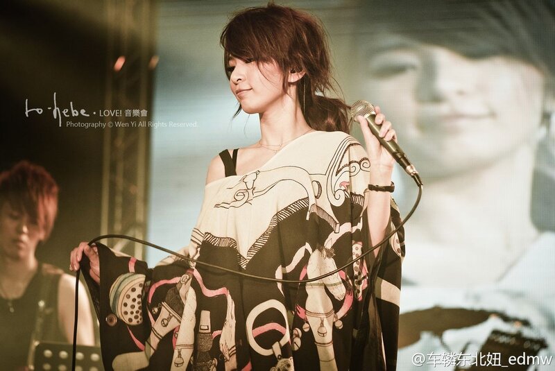 singer performing on stage