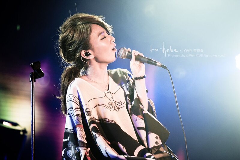 singer performing on stage