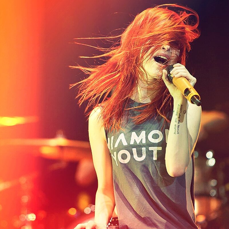 singer performing on stage