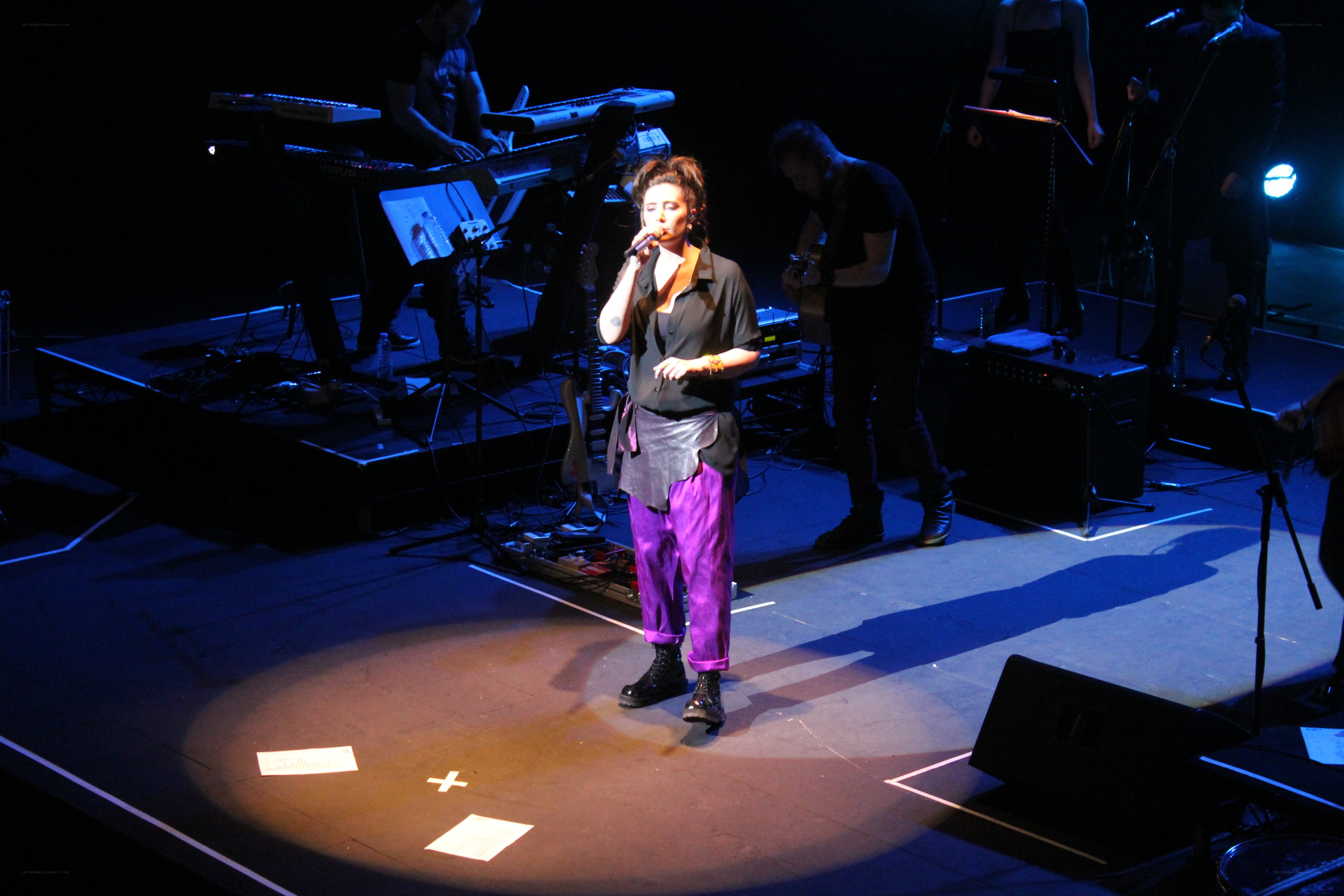 singer performing on stage