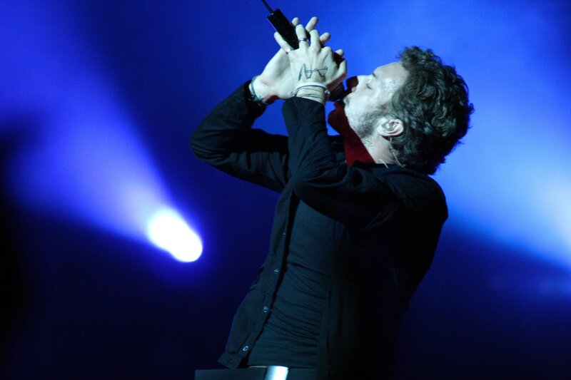 singer performing on stage