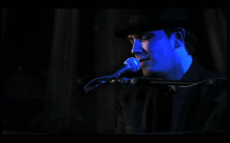singer performing on stage