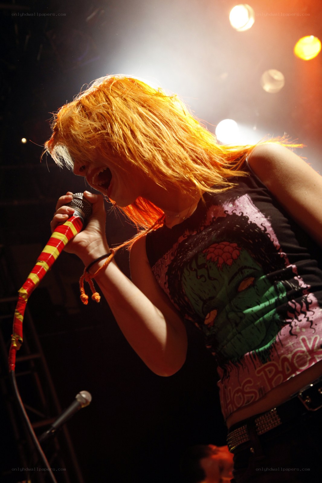 singer performing on stage