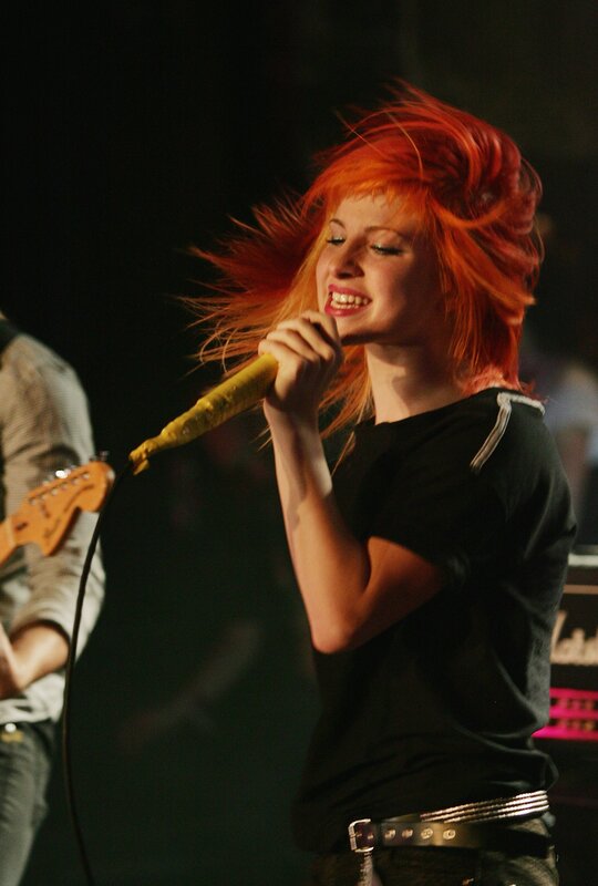 singer performing on stage