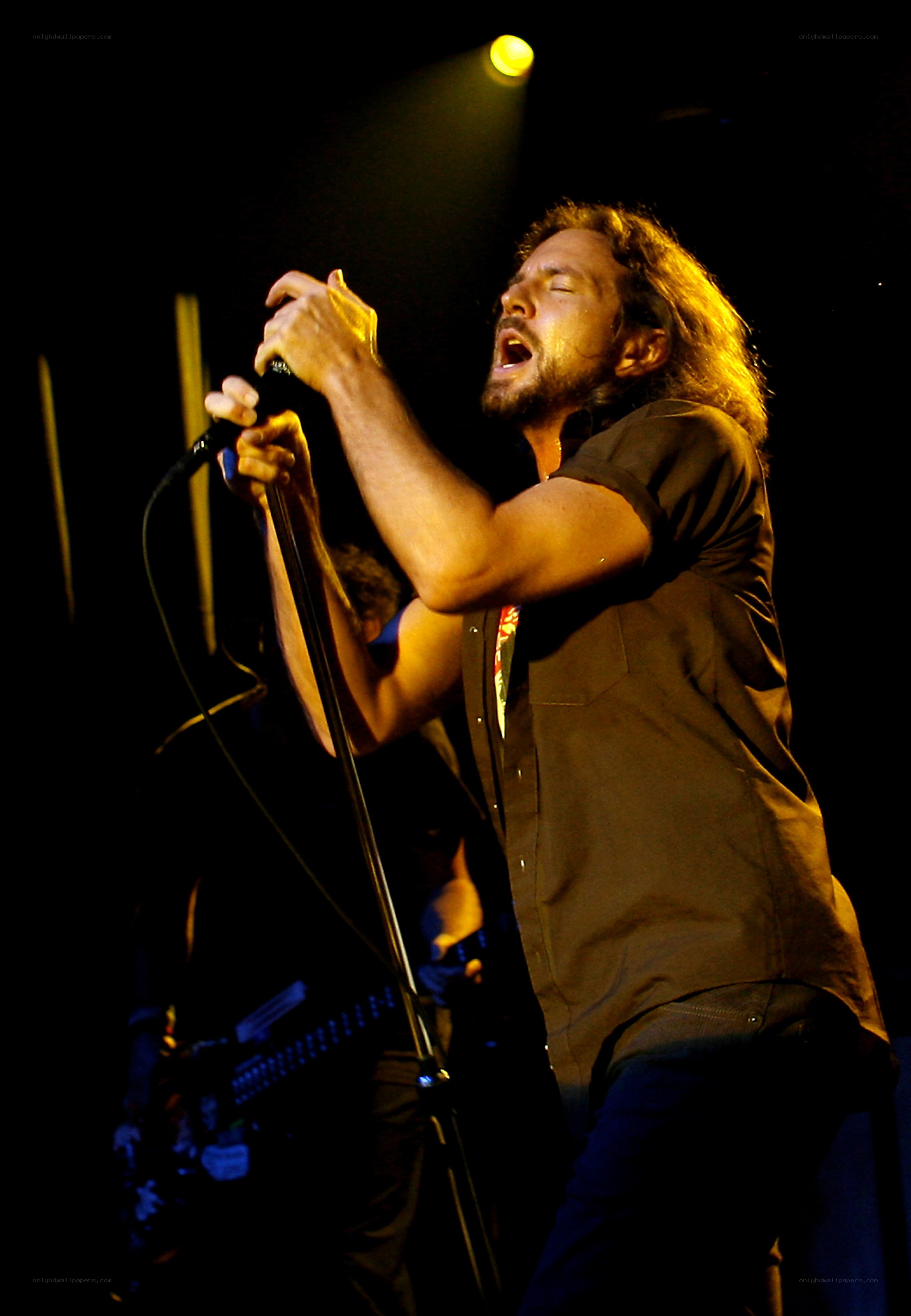 singer performing on stage