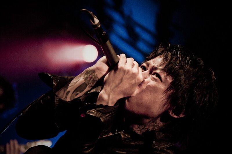 Singer Performing on Stage — Black, Dramatic, Night