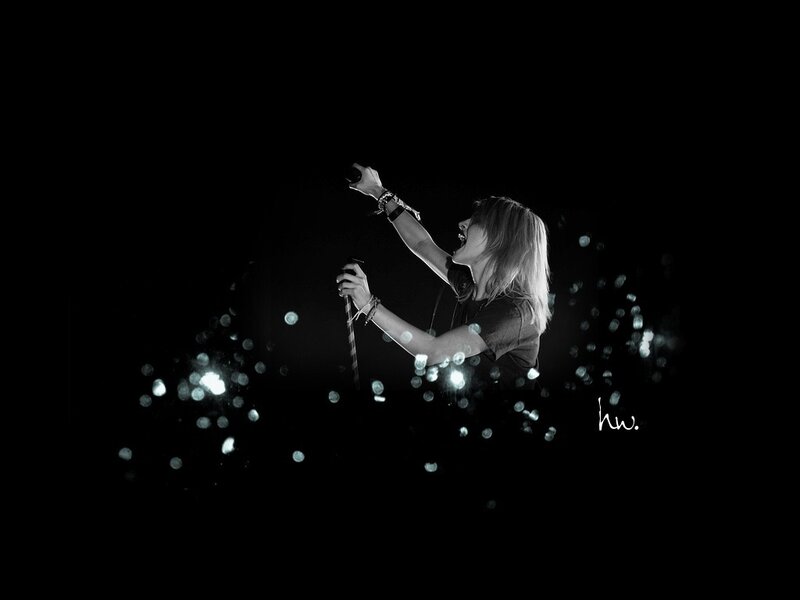 Singer Performing on Stage — Black, Dramatic