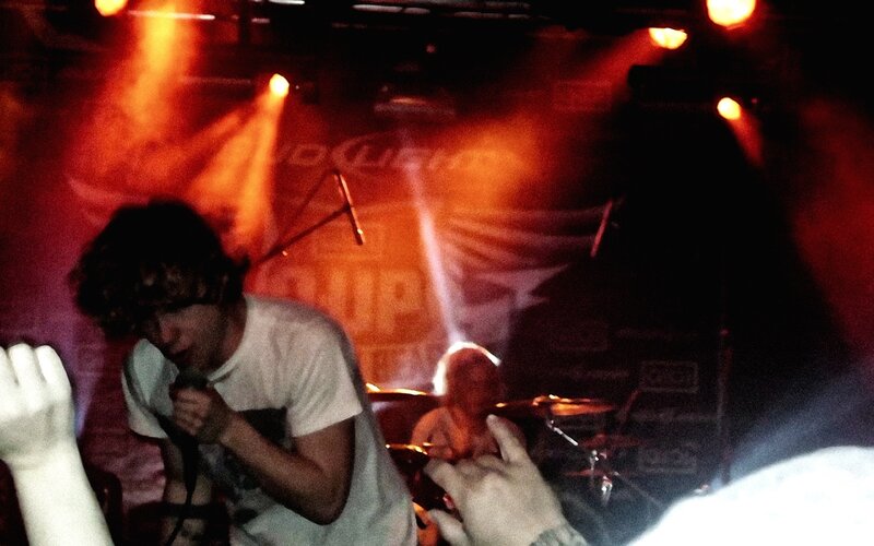 Singer Performing on Stage — Red, Dark