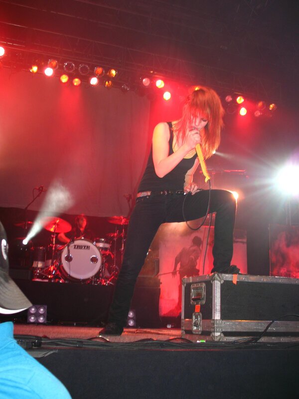 Singer Performing on Stage — Red