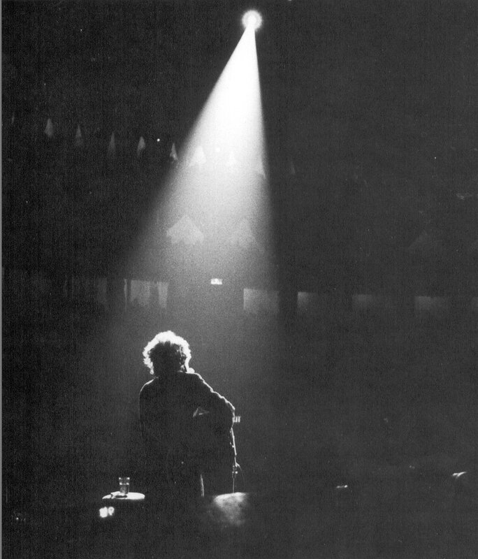 singer under spotlight