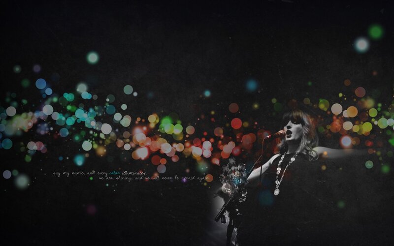singer with colorful lights