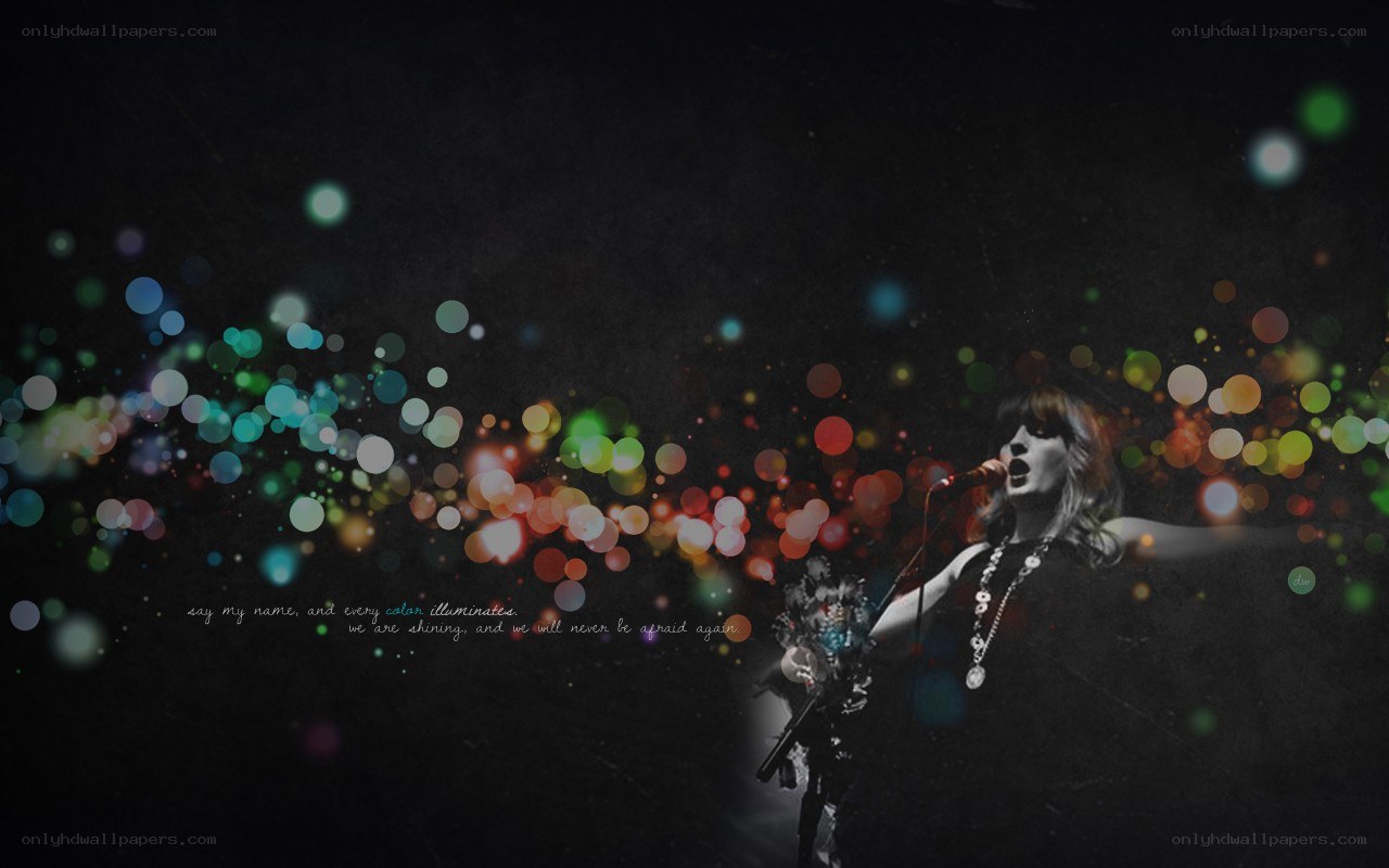 singer with colorful lights