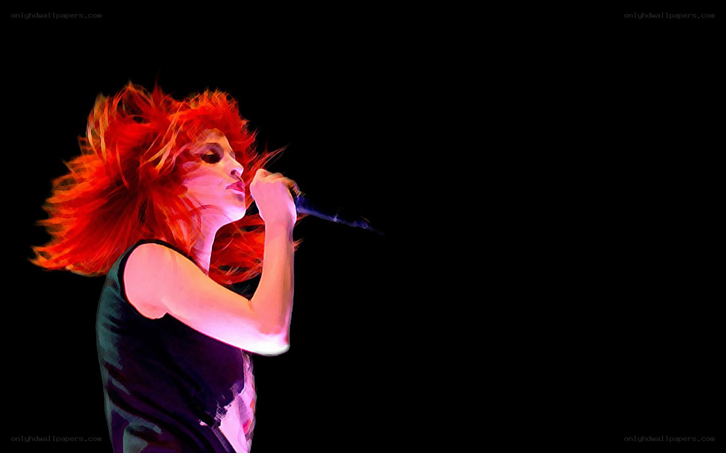 singer with red hair performing