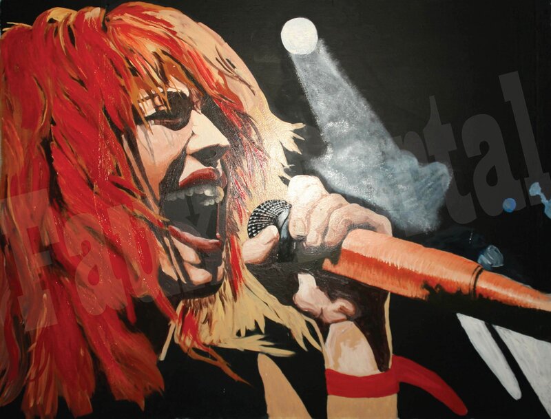 singer with red hair singing into microphone