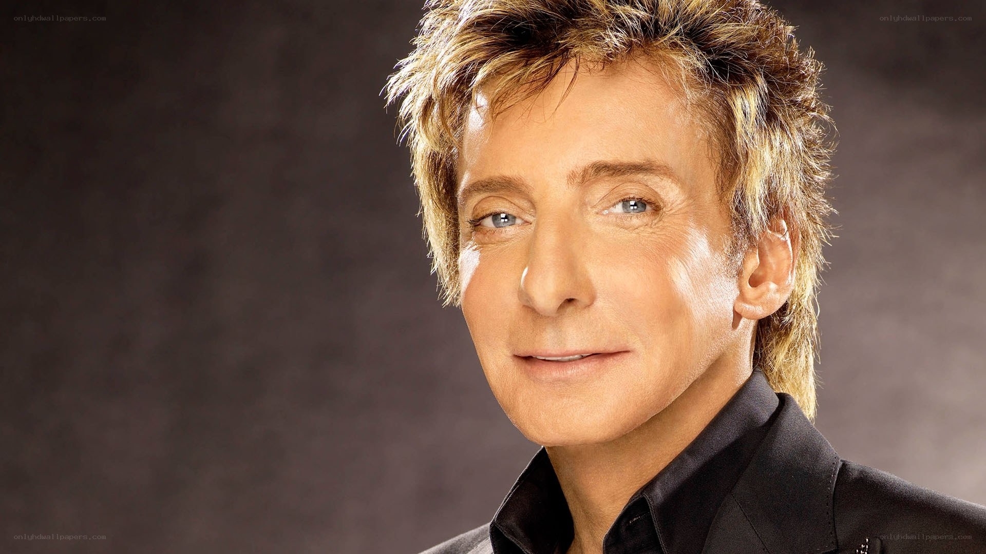 singer with spiky hair