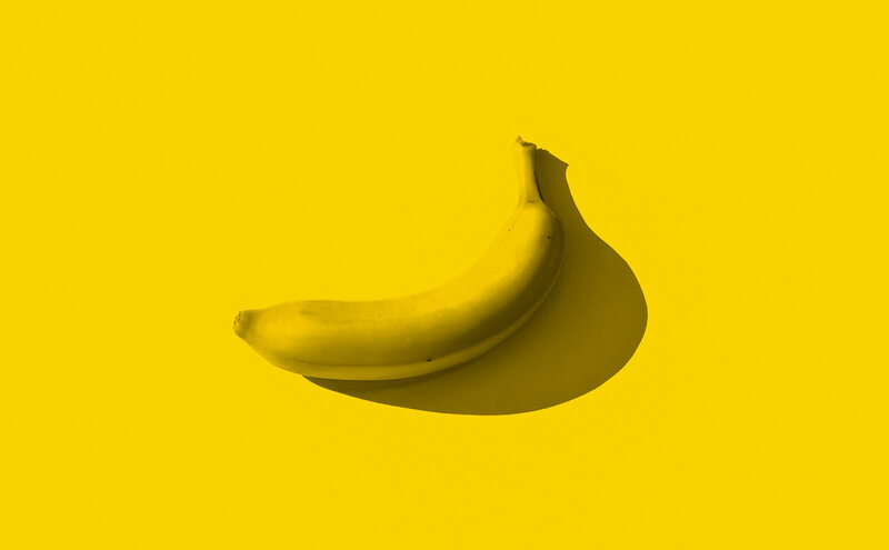 Single Banana on Yellow