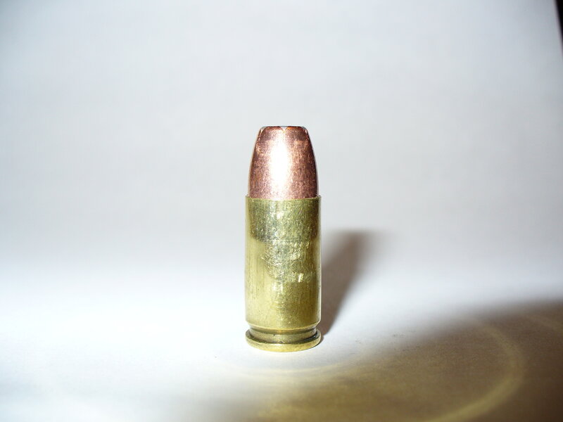 single bullet standing upright
