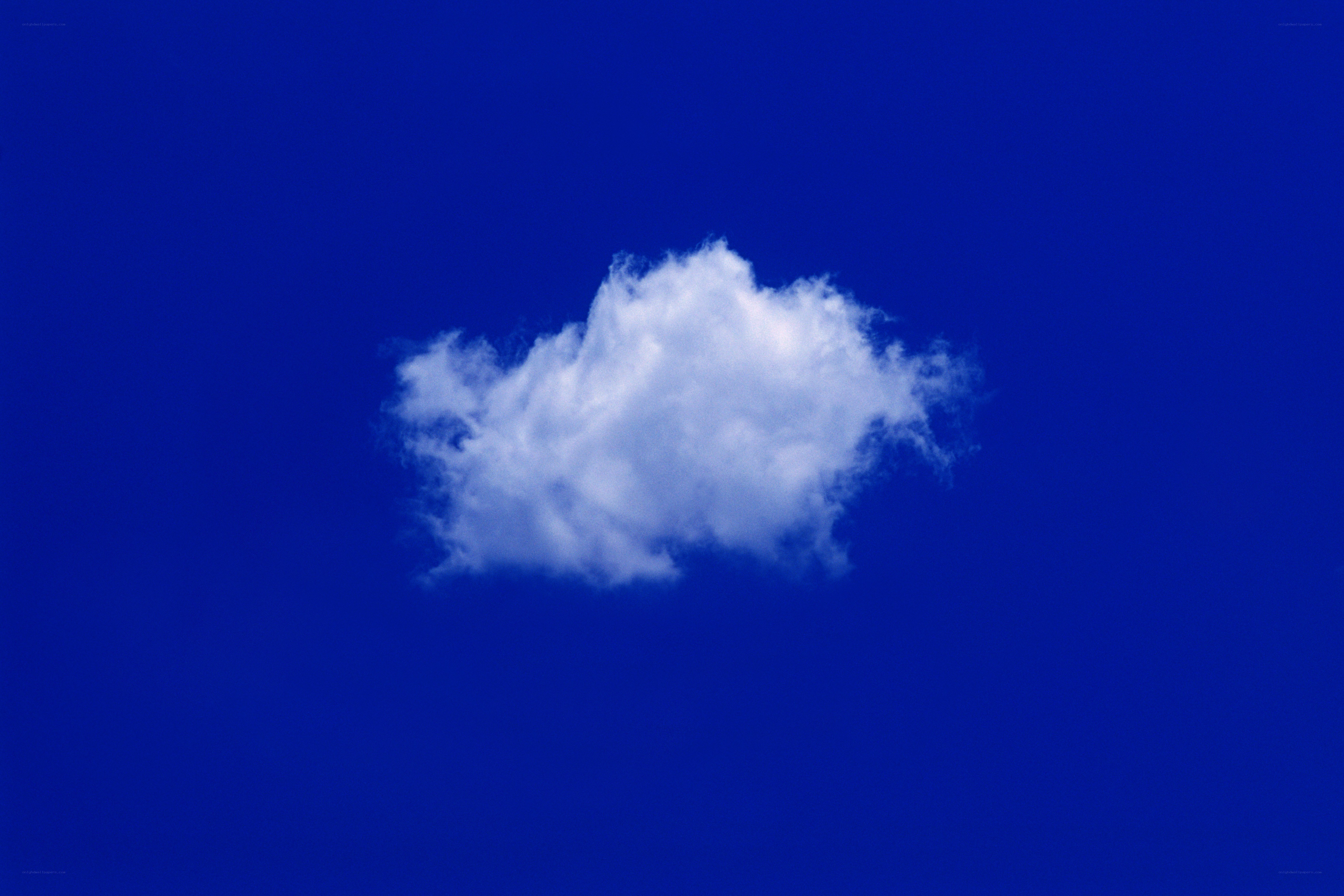 single cloud in blue sky
