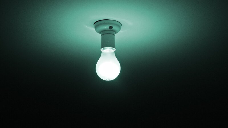 single light bulb on ceiling