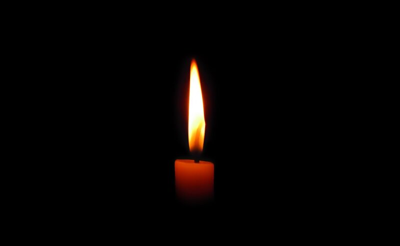 Single Lit Candle — Black