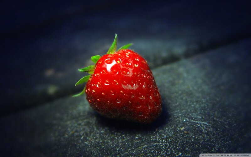 Single Strawberry on Surface — Red, Dramatic